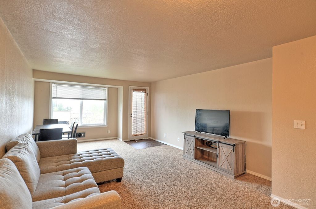 Photo of 4891 76th Street SW #C302, Mukilteo, WA 98275 (MLS # 2368556)