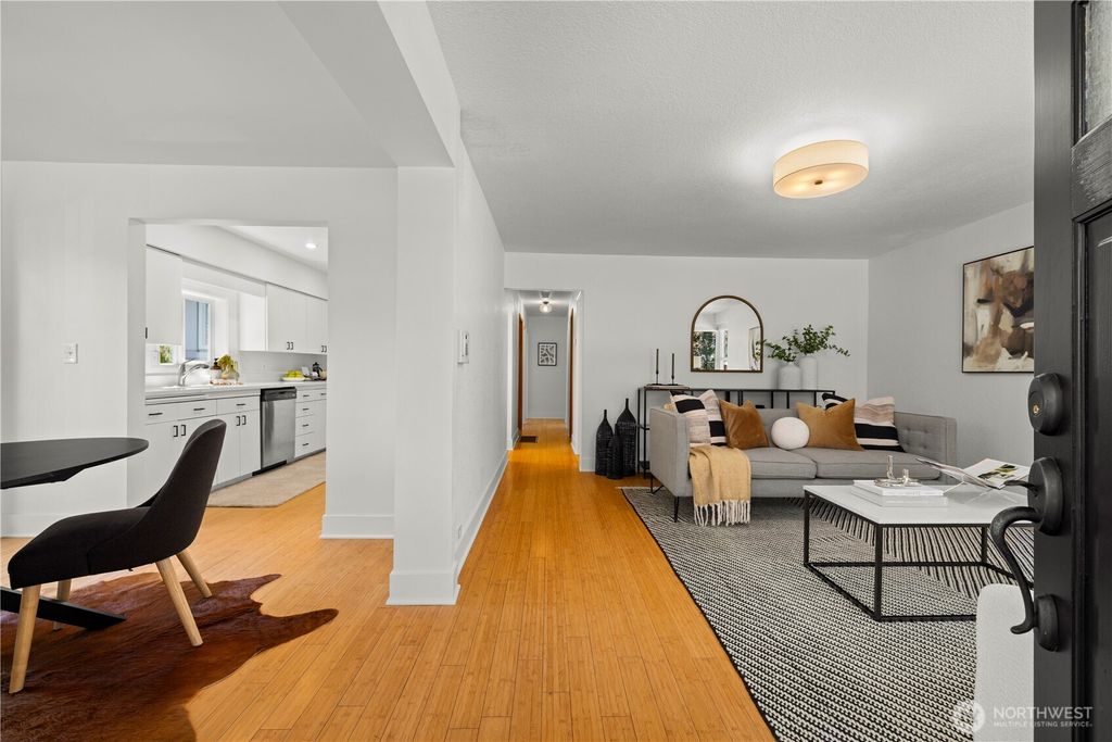Photo of 7729 30th Avenue SW, Seattle, WA 98126 (MLS # 2424926)