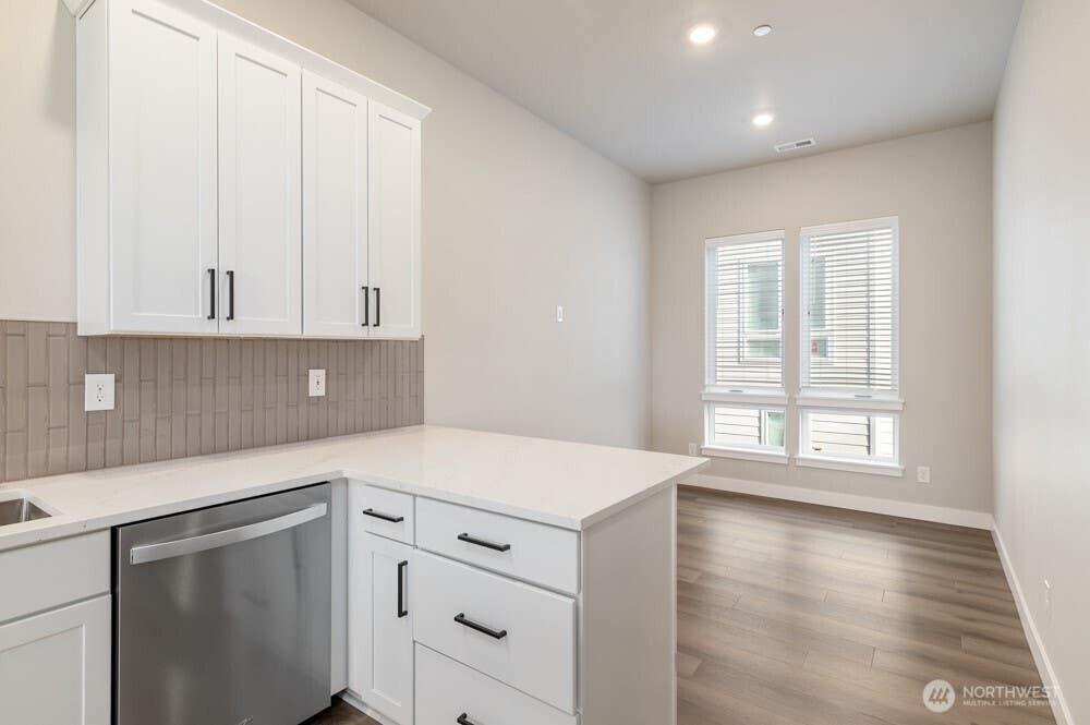 Photo of 6613 S 128th Street, Seattle, WA 98178 (MLS # 2534387)