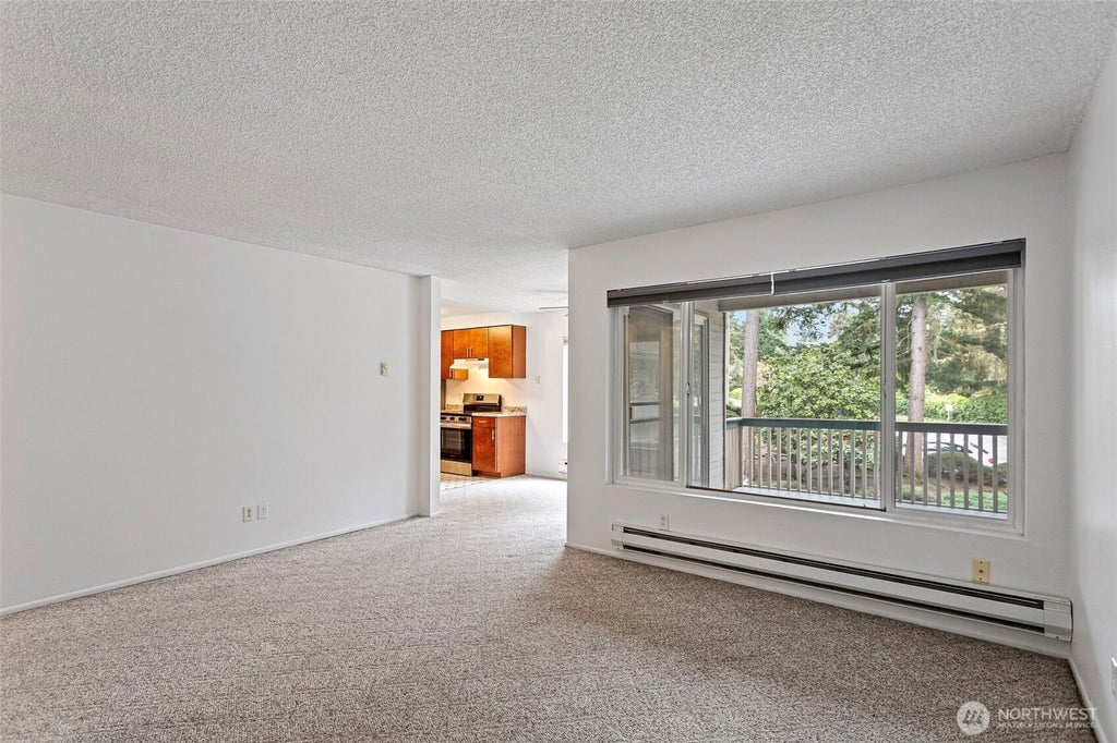 Photo of 5620 200th Street SW #A102, Lynnwood, WA 98036 (MLS # 2555345)