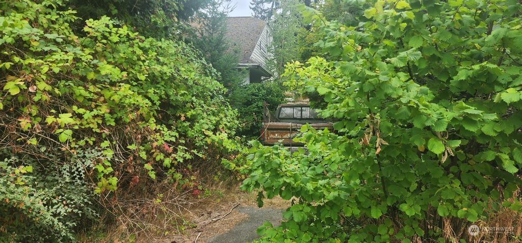 Photo of 601 N 127th Street, Seattle, WA 98133 (MLS # 2264331)