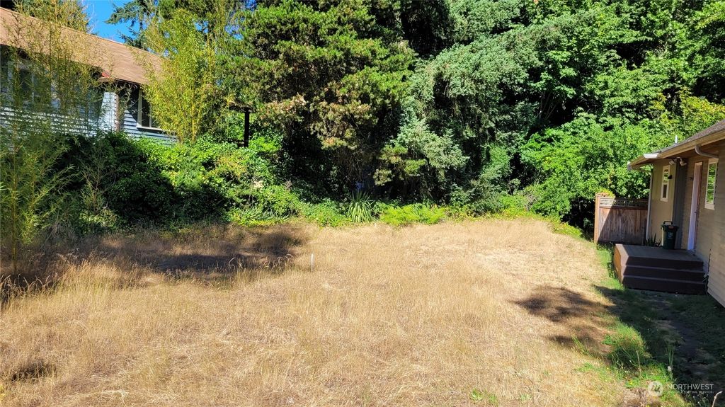 Photo of 11740 35th Avenue NE, Seattle, WA 98125 (MLS # 2143563)