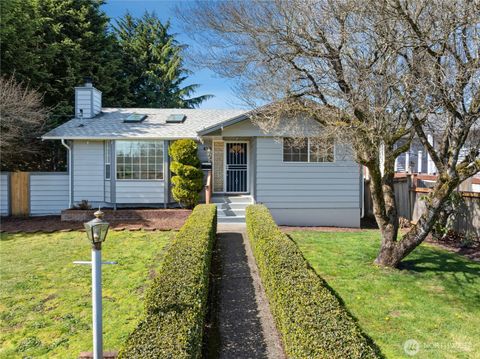 Photo of 822 S Winnifred Street, Tacoma, WA 98465 (MLS # 2502614)