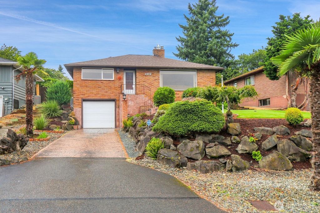 Photo of 4012 SW 107th Street, Seattle, WA 98146 (MLS # 2422068)