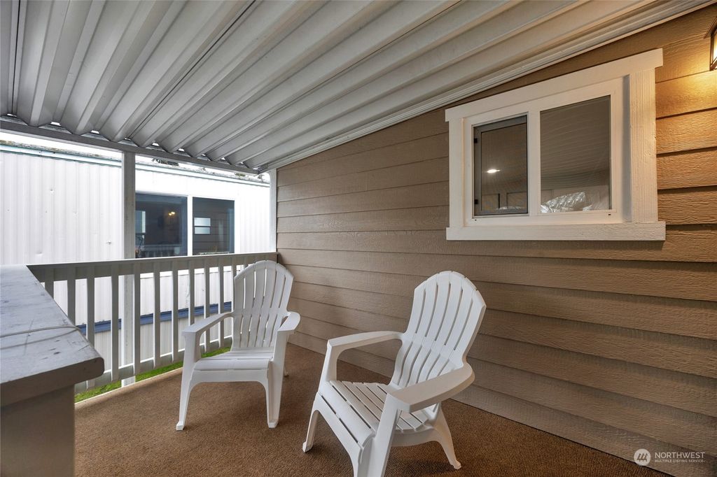 Photo of 7301 NE 175th St Street #209, Kenmore, WA 98028 (MLS # 2319618)