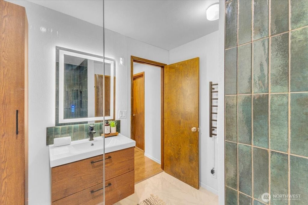 Photo of 654 W Olympic Place #101, Seattle, WA 98119 (MLS # 2440882)