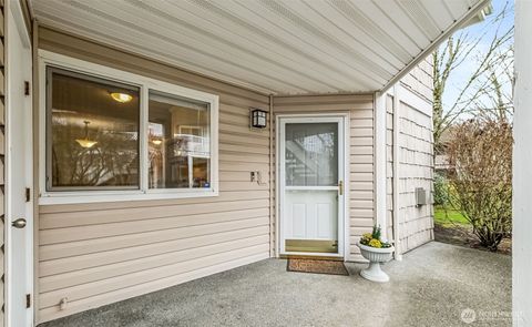 Photo of 11130 SE 208th Street #A104, Kent, WA 98031 (MLS # 2465040)