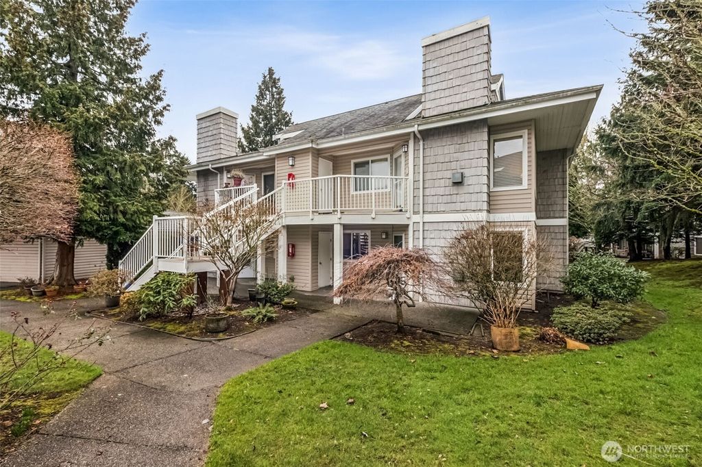 Photo of 11130 SE 208th Street #A104, Kent, WA 98031 (MLS # 2465040)