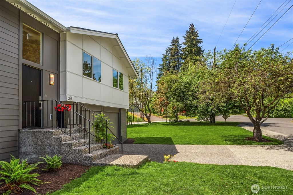 Photo of 303 NE 133rd Street, Seattle, WA 98125 (MLS # 2383102)