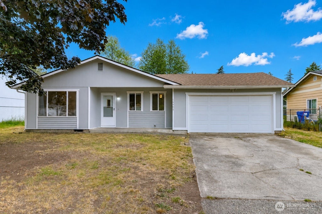 Photo of 15406 11th Avenue Ct E, Tacoma, WA 98445 (MLS # 2547037)