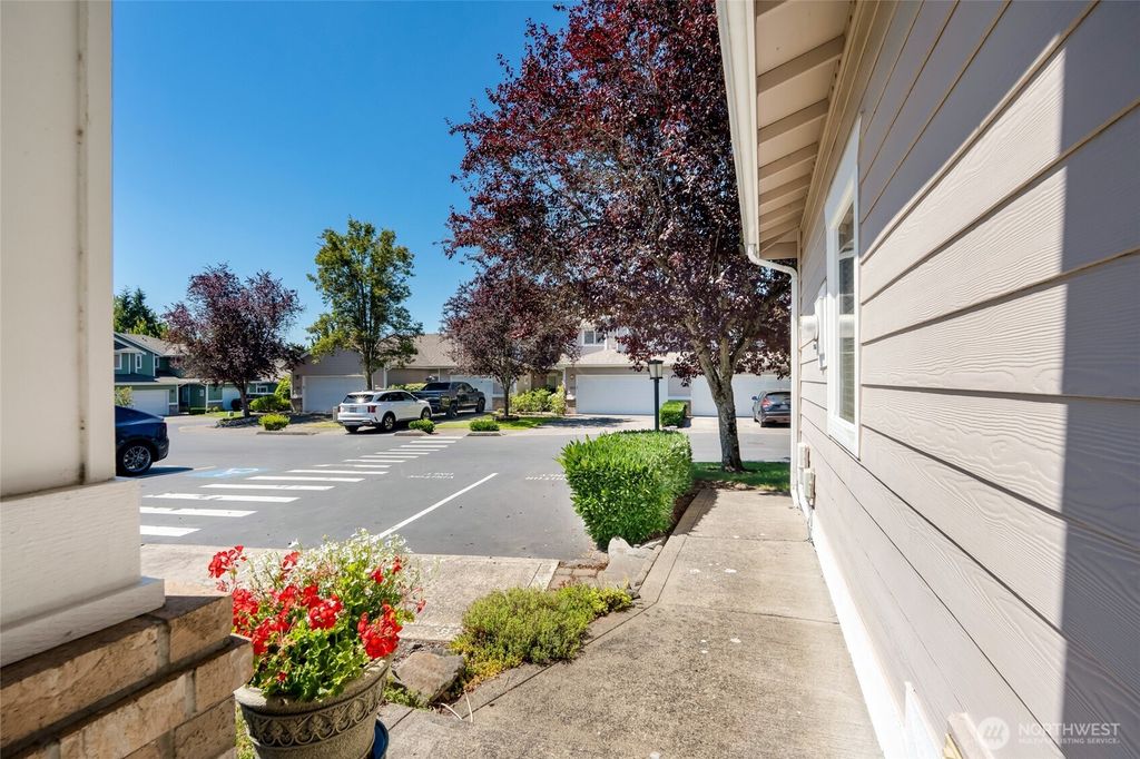 Photo of 10700 SE 260th Street #E 104, Kent, WA 98030 (MLS # 2415010)