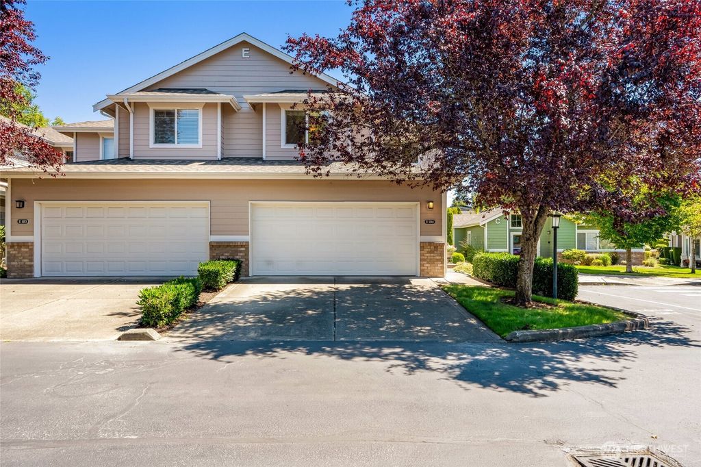 Photo of 10700 SE 260th Street #E 104, Kent, WA 98030 (MLS # 2415010)