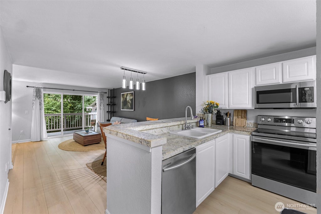 Photo of 13150 102nd Lane NE #4, Kirkland, WA 98034 (MLS # 2581507)
