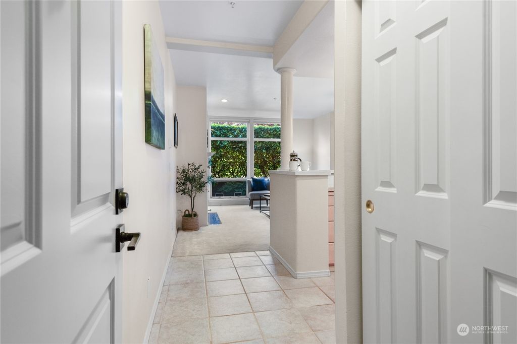 Photo of 3221 SW Avalon Way #101, Seattle, WA 98126 (MLS # 2257753)