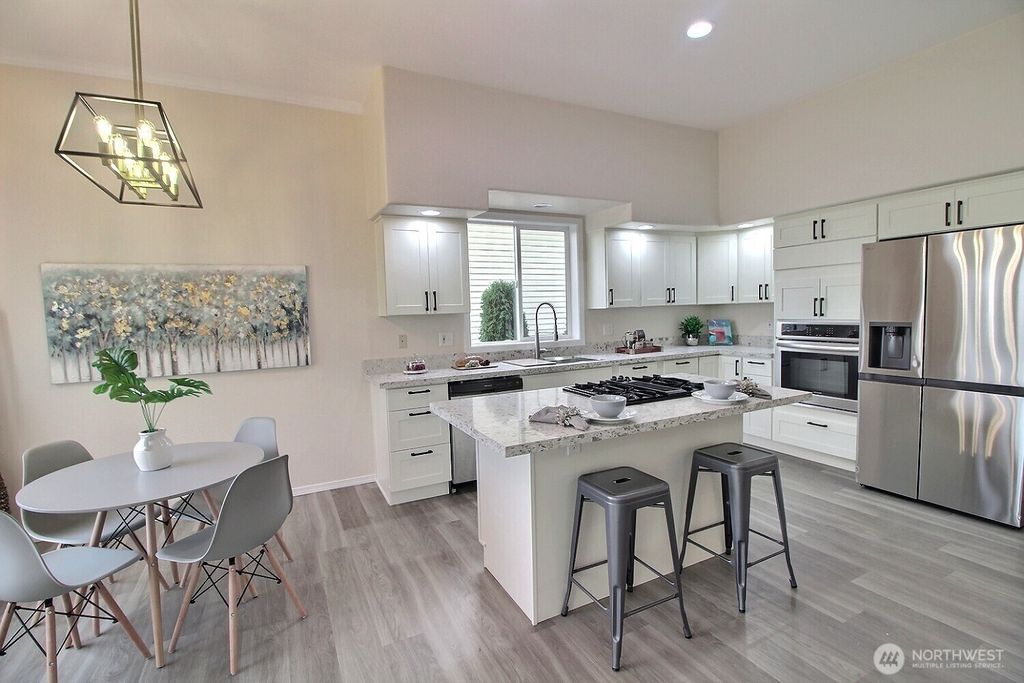 Photo of 314 S 20th Place, Renton, WA 98055 (MLS # 2344185)