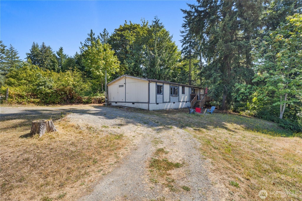 Photo of 15931 SE Lake Moneysmith Road, Auburn, WA 98092 (MLS # 2581870)