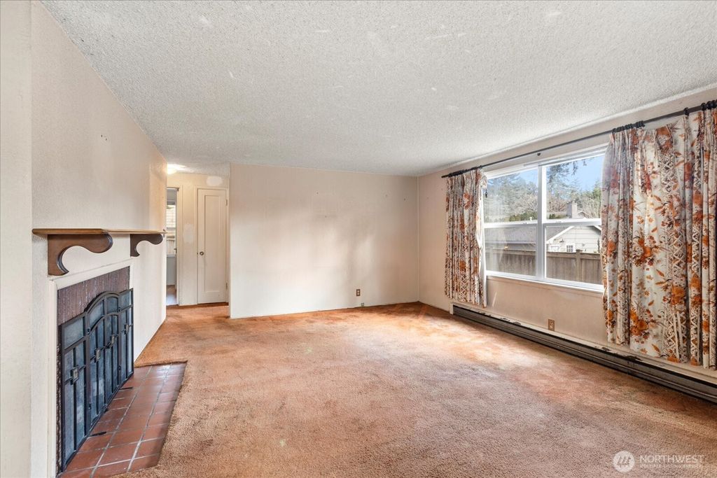 Photo of 602 NW 185th Street, Shoreline, WA 98177 (MLS # 2335578)