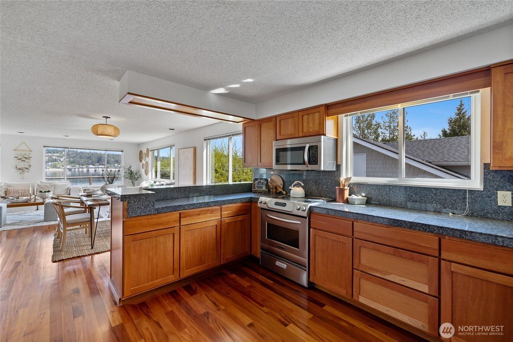 Photo of 209 Bella Bella Drive, Fox Island, WA 98333 (MLS # 2504000)