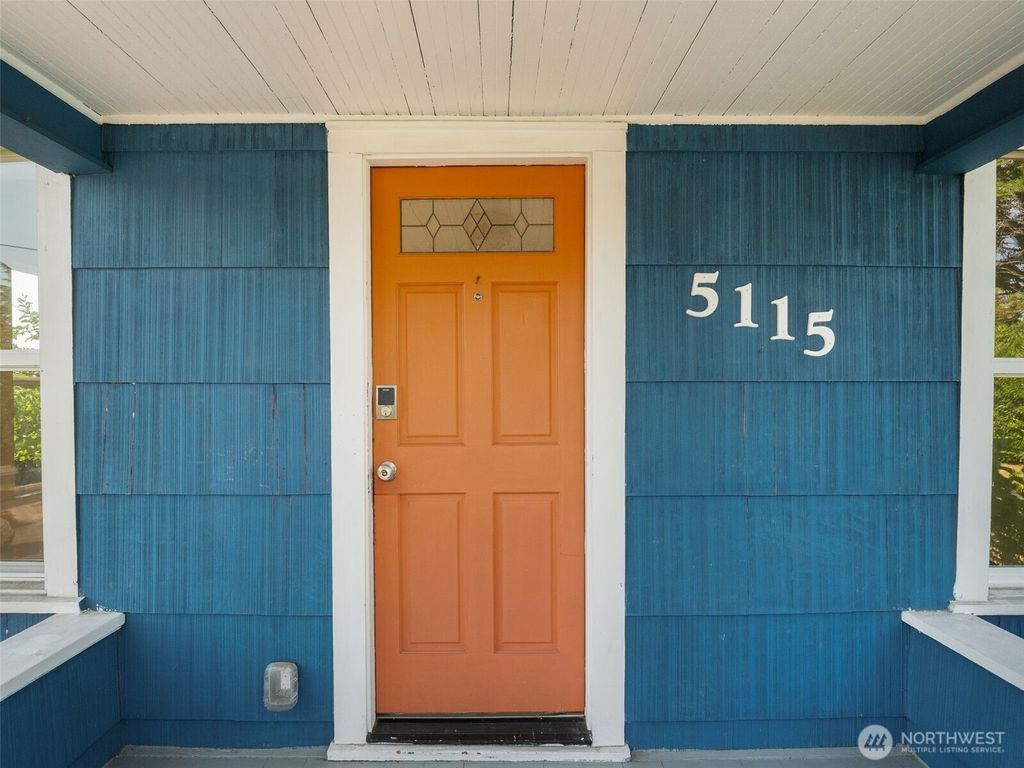 Photo of 5115 S Mayflower Street, Seattle, WA 98118 (MLS # 2425013)