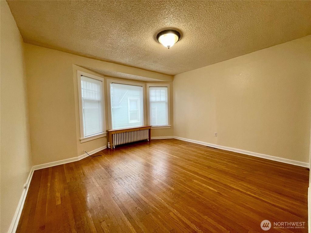 Photo of 317 17th Avenue E, Seattle, WA 98112 (MLS # 2505207)