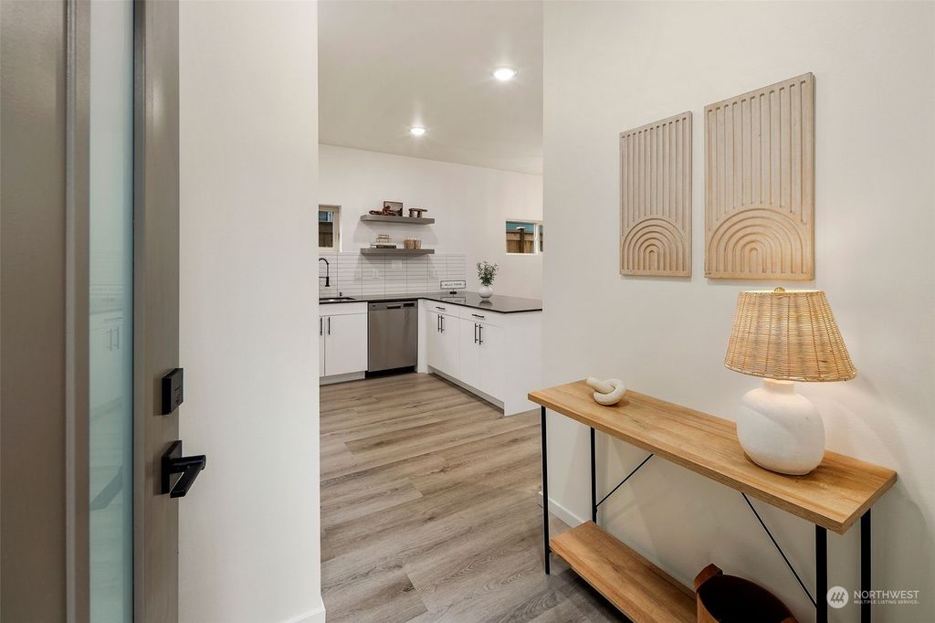 Photo of 8338 27th Avenue NW, Seattle, WA 98117 (MLS # 2196233)