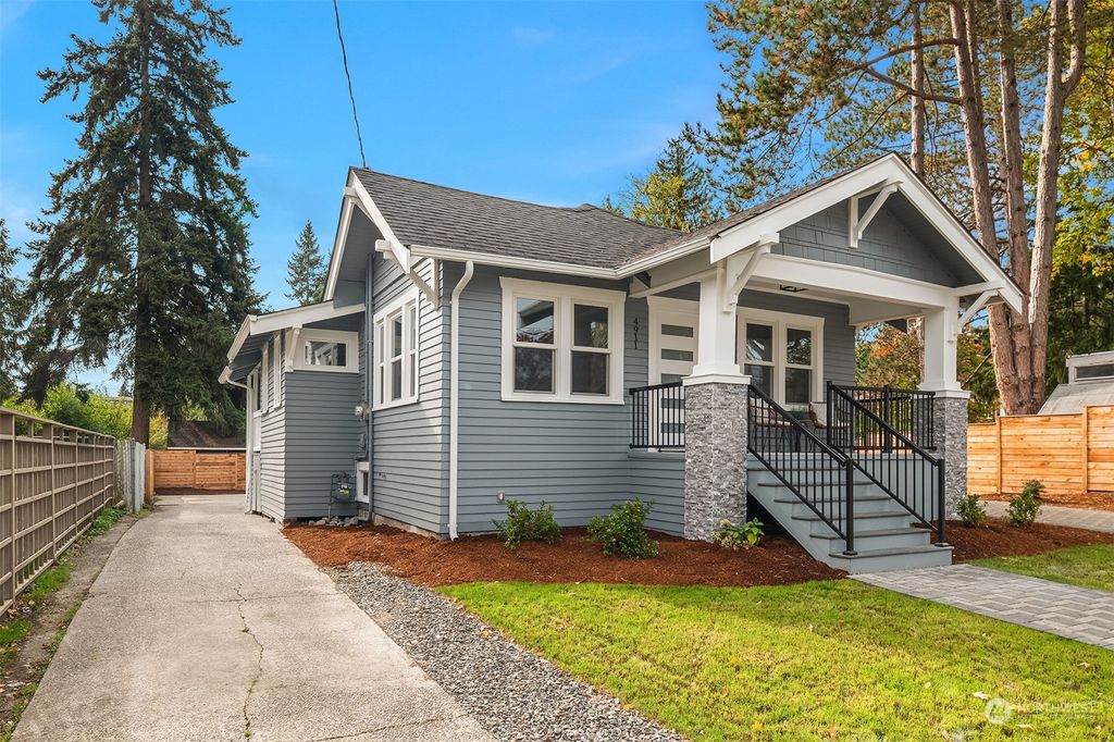 Photo of 4911 S Genesee Street, Seattle, WA 98118 (MLS # 2174969)