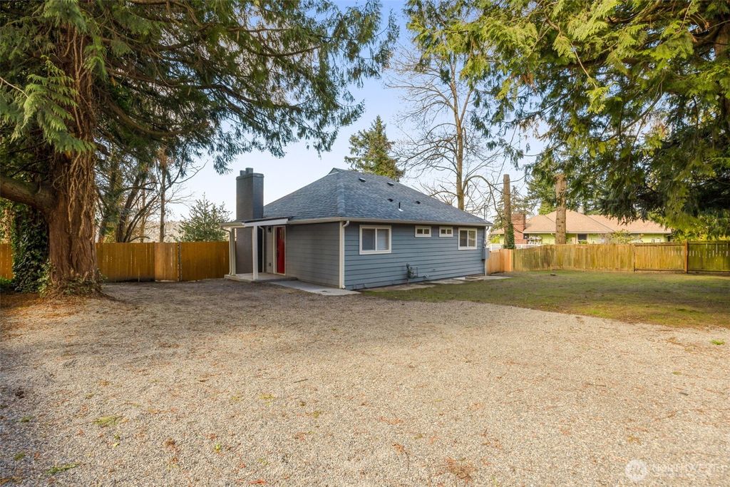 Photo of 12041 S 56th Place, Seattle, WA 98178 (MLS # 2497261)