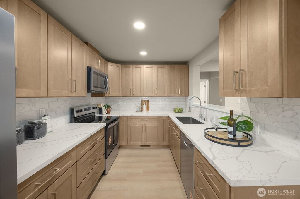 Photo of 12041 S 56th Place, Seattle, WA 98178 (MLS # 2497261)