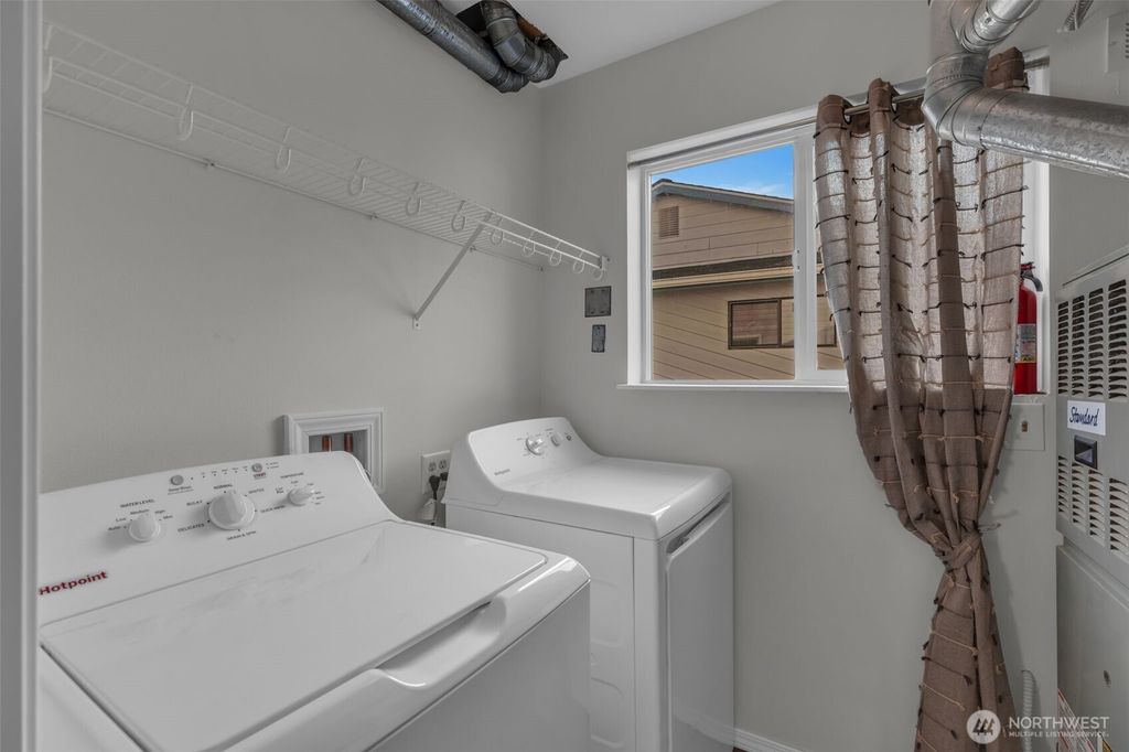 Photo of 9480 Olson Place SW #G, Seattle, WA 98106 (MLS # 2468434)