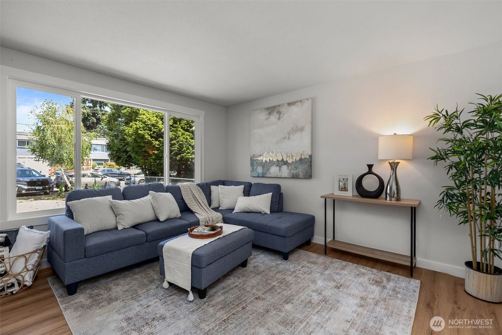 Photo of 4227 S Kenyon Street, Seattle, WA 98118 (MLS # 2412724)