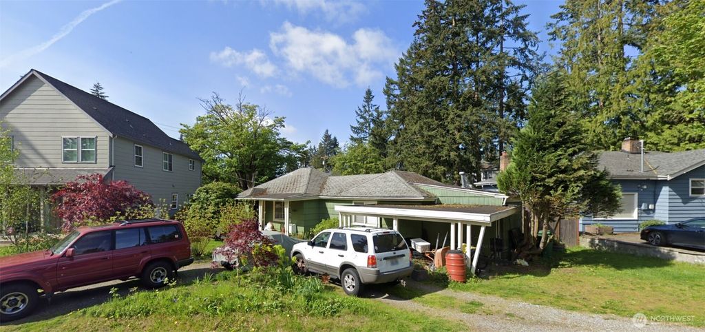 Photo of 11011 Goodwin Way NE, Seattle, WA 98125 (MLS # 2381360)