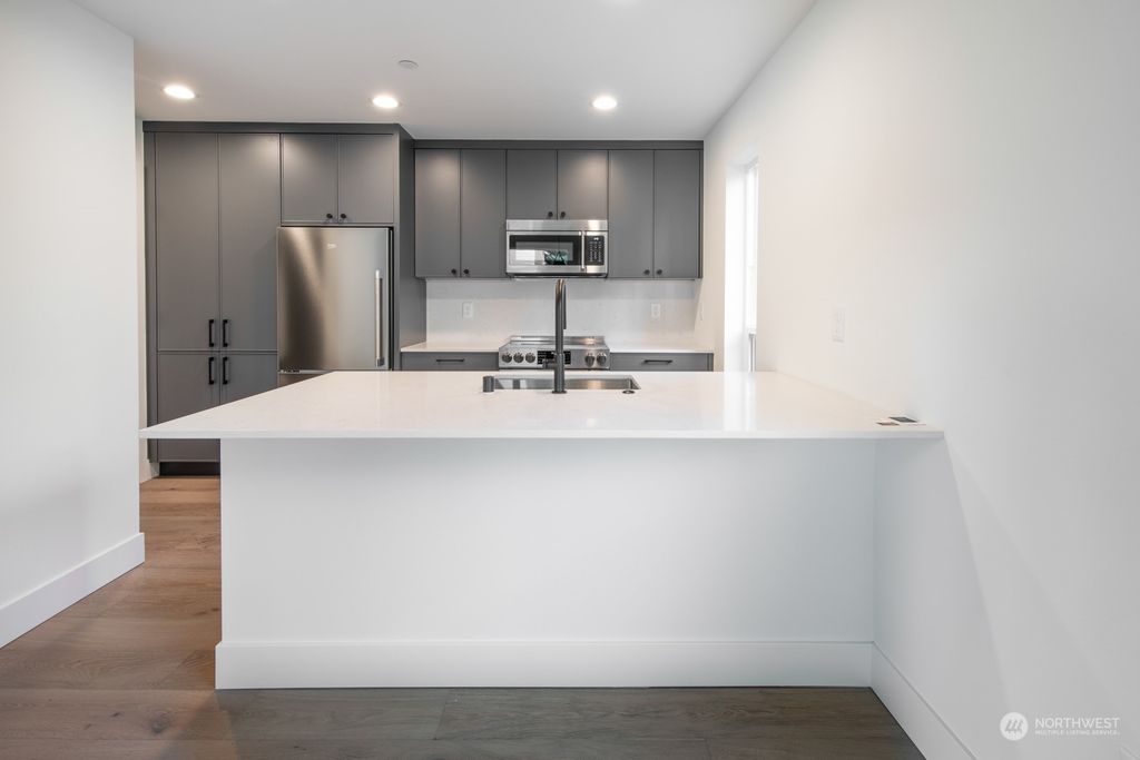 Photo of 13323 1st Avenue NE #C, Seattle, WA 98125 (MLS # 2077887)