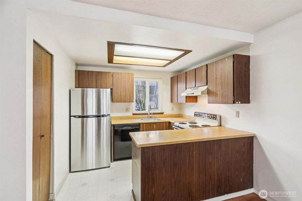 Photo of 8823 Holly Drive #D203, Everett, WA 98208 (MLS # 2475040)