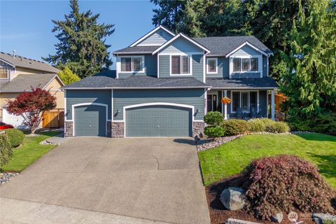 Photo of 8207 66th Avenue Ct E, Puyallup, WA 98371 (MLS # 2439487)