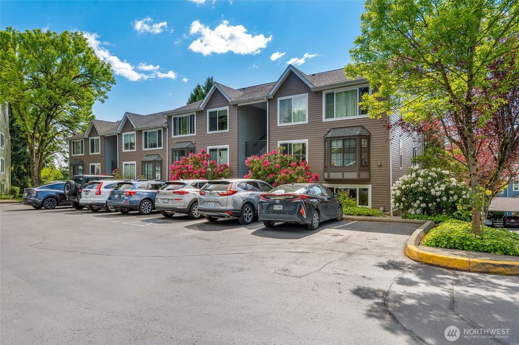 Photo of 12724 NE 144th Street #E-104, Kirkland, WA 98034 (MLS # 2374474)