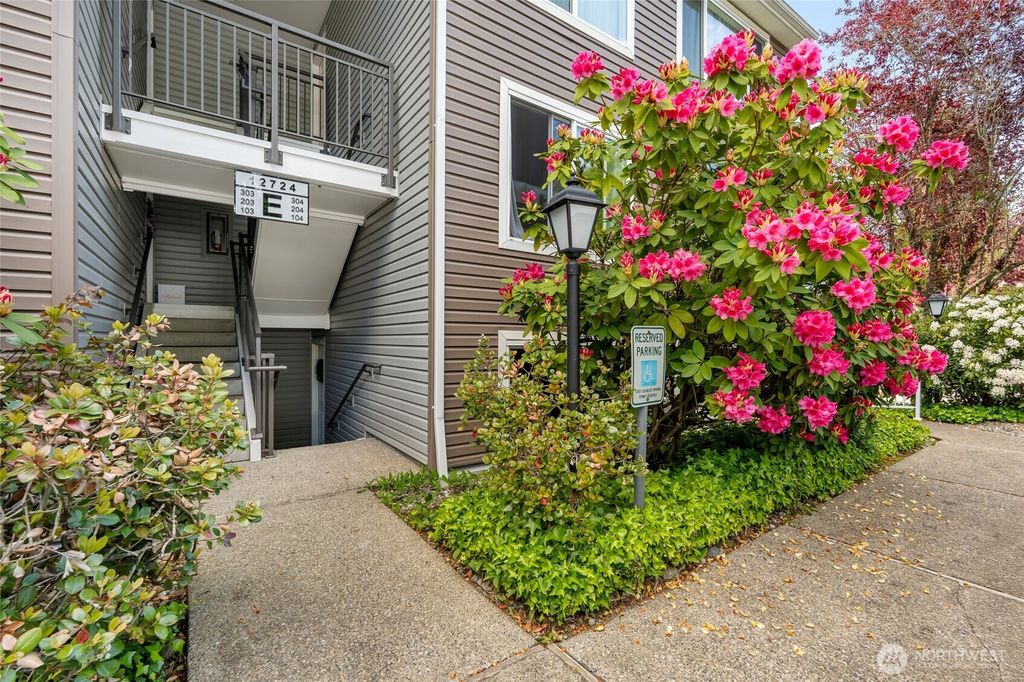 Photo of 12724 NE 144th Street #E-104, Kirkland, WA 98034 (MLS # 2374474)