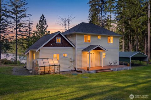 Photo of 6971 NE Tahuya Blacksmith Road, Tahuya, WA 98588 (MLS # 2523343)