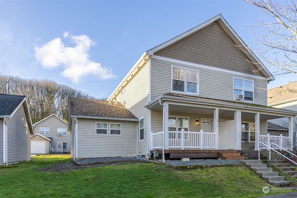 Photo of 5719 33rd Avenue S, Seattle, WA 98118 (MLS # 2320819)