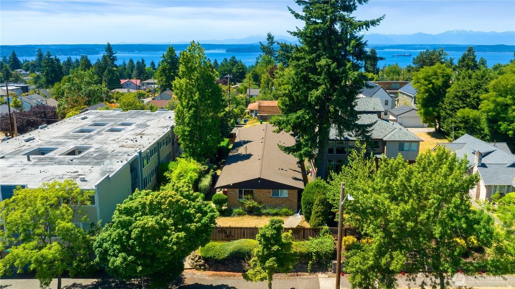 Photo of 7343 35th Ave SW, Seattle, WA 98126 (MLS # 2402501)