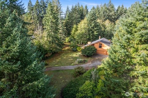 Photo of 8727 Johnson Point Road NE, Olympia, WA 98516 (MLS # 2439382)