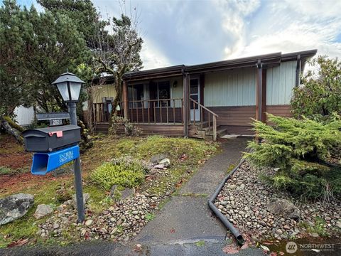 Photo of 202 Ho Hum Lane, Aberdeen, WA 98520 (MLS # 2461512)