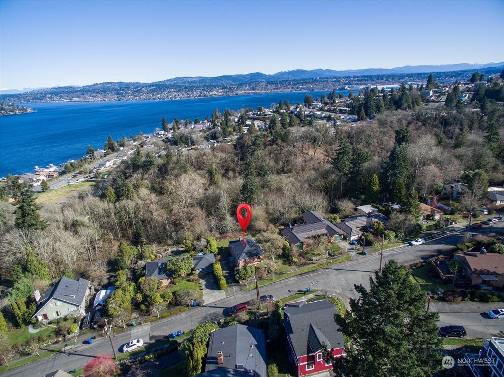 Photo of 10250 SE Waters Ave S Ave, Seattle, WA 98178 (MLS # 2202337)