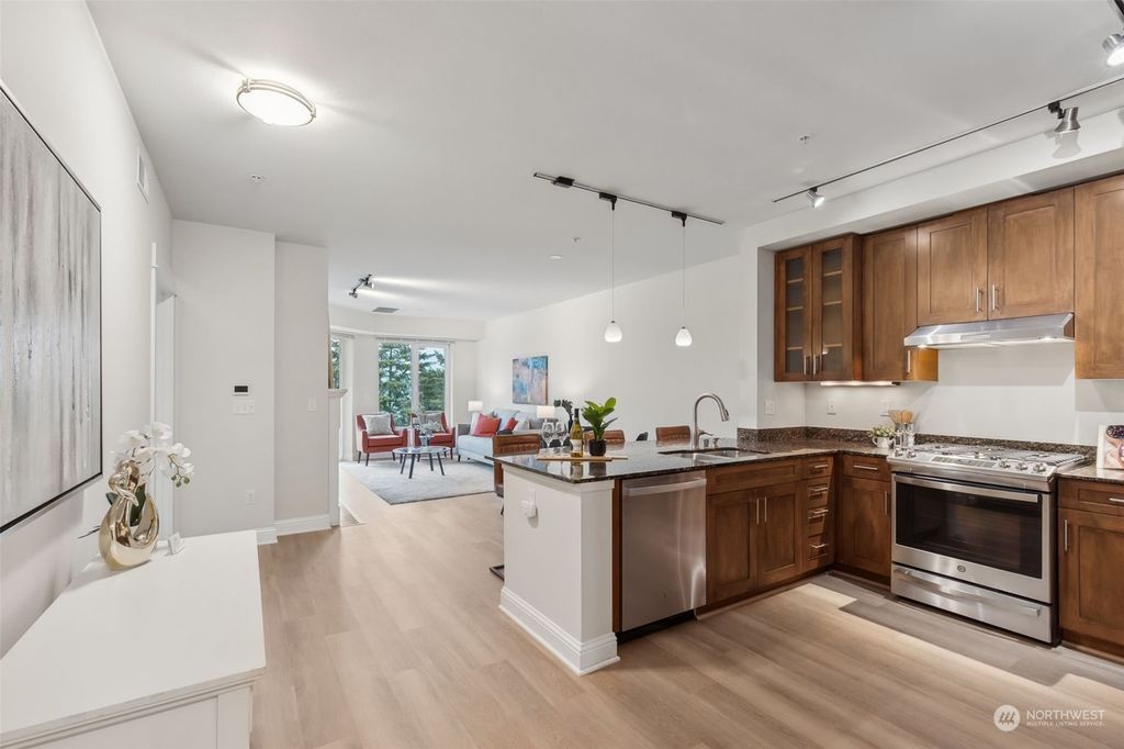 Photo of 18707 SE Newport Way #402, Issaquah, WA 98027 (MLS # 2244504)