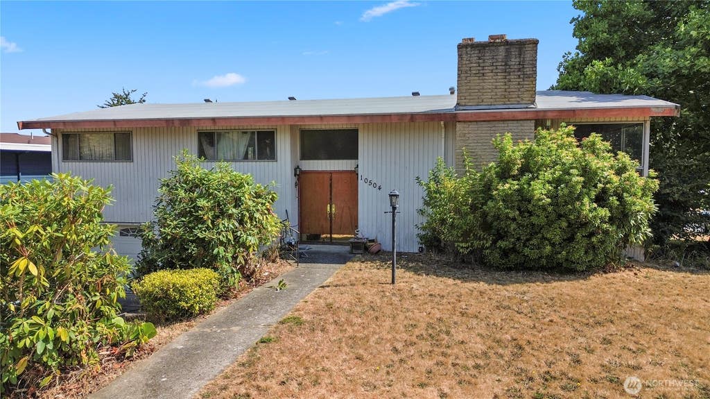 Photo of 10504 12th Avenue NW, Seattle, WA 98177 (MLS # 2573053)