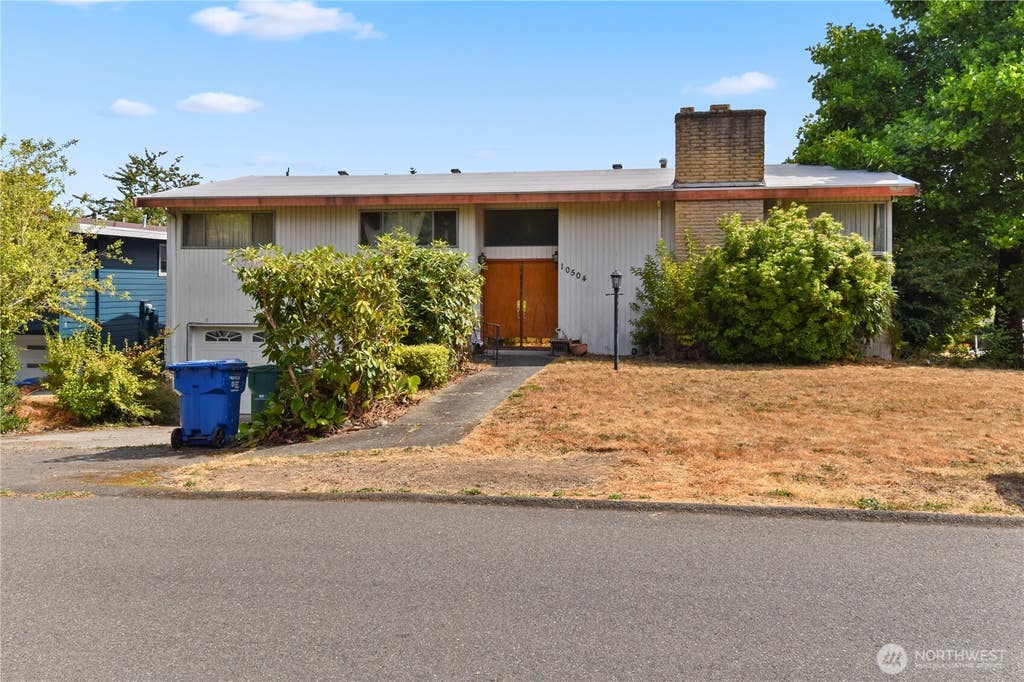 Photo of 10504 12th Avenue NW, Seattle, WA 98177 (MLS # 2573053)