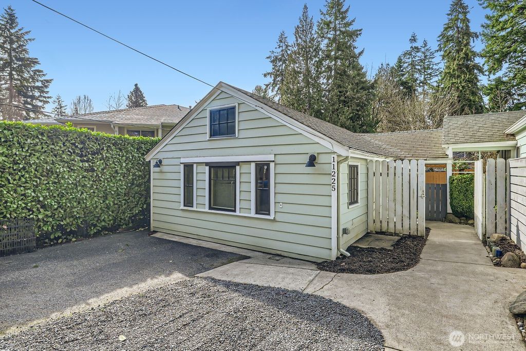 Photo of 11225 Goodwin Way NE, Seattle, WA 98125 (MLS # 2338002)