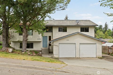 Photo of 12220 SE 217th Place, Kent, WA 98031 (MLS # 2521564)