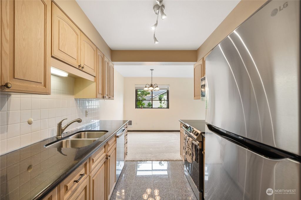 Photo of 12300 33rd Avenue NE #304, Seattle, WA 98125 (MLS # 2148056)