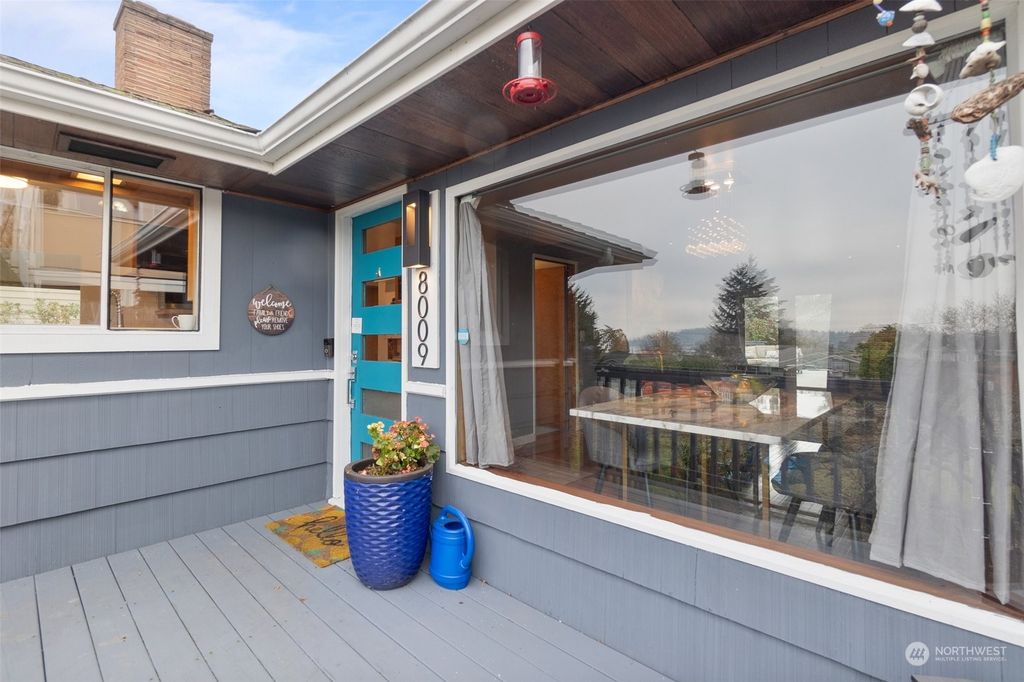 Photo of 8009 S Lakeridge Drive, Seattle, WA 98178 (MLS # 2323150)
