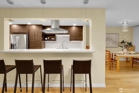 Photo of 1548 NE 140th Street #F2, Seattle, WA 98125 (MLS # 2422362)